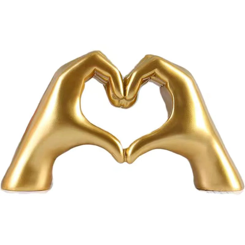 Heart hand statue